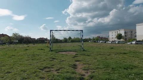 Empty goal on soccer field. Point of view moving camera. Zoom out Stock Footage 131095436