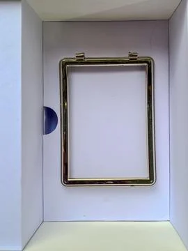 Empty Gold Rectangular Frame in White Box Packaging Stock Photos