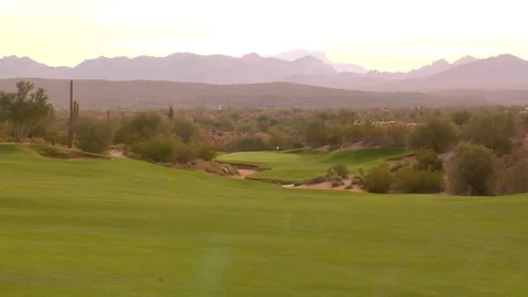 Empty golf course resort mountain range in background Stock Footage 125276921
