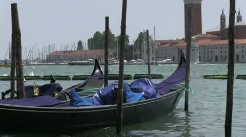 Empty Gondola floating in water Stockbeeldmateriaal 13696816