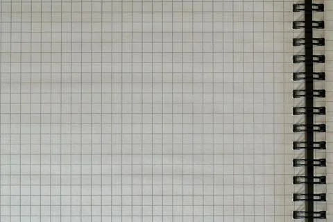 Empty graph paper notebook page spiral binding background Stock Photos