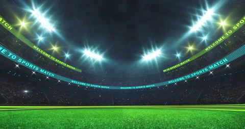 Empty grass playground and grand stadium full of fans and shining floodlights. Stock Footage 172070857