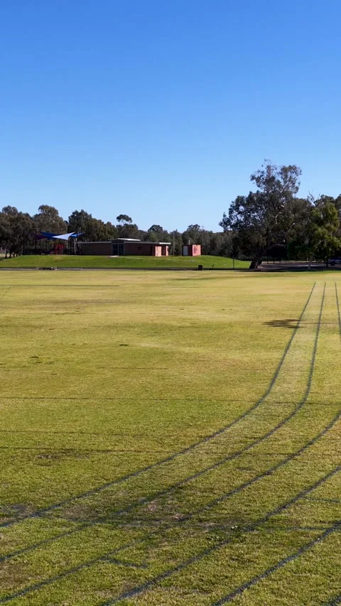Empty Grass Running Track and Athletic Field in Rural Australia Stock Footage 340881367