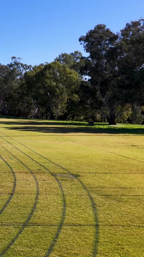 Empty Grass Running Track at Rural Athletic Oval Stock Footage 341649710