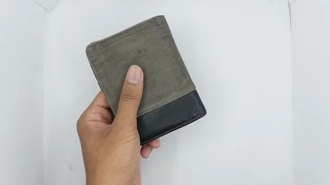 An empty gray and black wallet does not contain money Stock Photos