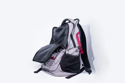 Empty gray backpack isolated on white background Stock Photos