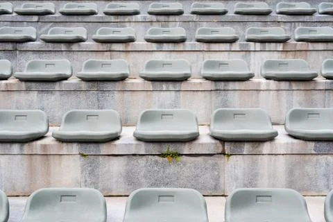 Empty gray stadium seats 스톡 사진