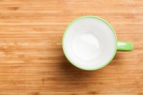 Empty green coffee, tea mug, cup, top view on wood Stock Photos