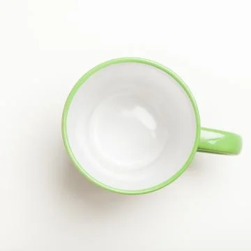 Empty green coffee, tea mug, cup, top view on white Stock Photos