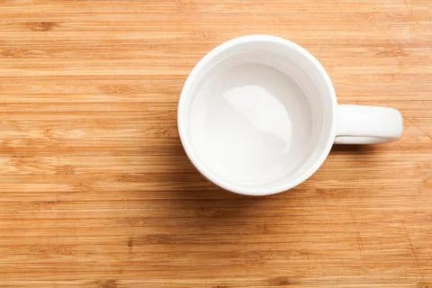 Empty green coffee, tea mug, cup, top view on wood Stock Photos