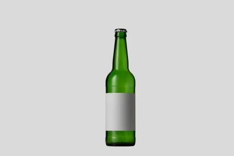 Empty green colored beer bottle. Isolated on white studio background Stock Photos