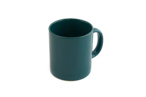 Empty green mug on a white background Stock Photos