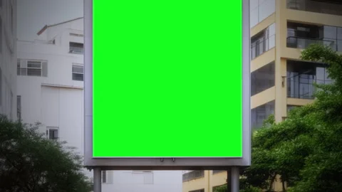 Empty Green Screen Billboard Mockup in Urban Street Scene for Advertising, Tilt 库存影片 336711355