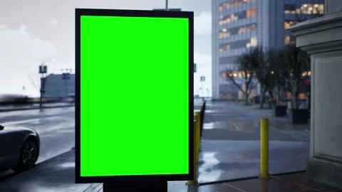 Empty green screen billboard mockup on a downtown sidewalk in the afternoon Stock Footage 345500954