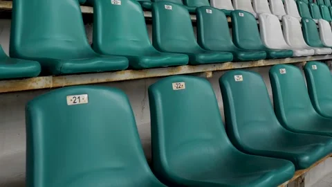 Empty Green Stadium Seats. Empty green plastic seats in stadium Video stock 321280873