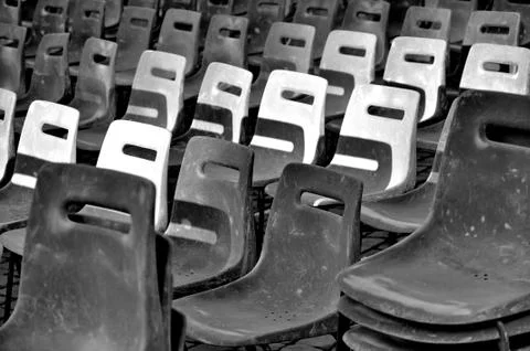 Empty grey chairs Stock Photos