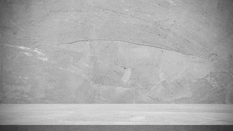 Empty grey concrete tabletop with textured wall background, offering a clea.. Stock Photos