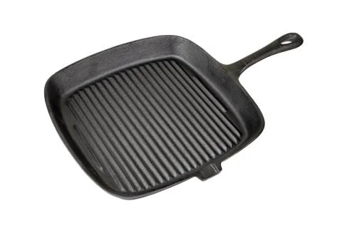 Empty grill iron pan isolated on white background 写真素材