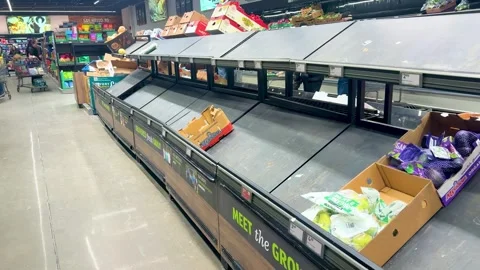 Empty Grocery Shelves at Aldi on January 25, 2026 – Winter Storm Panic in the Stock Footage 328153443