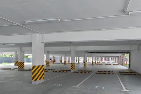 Empty ground parking in the yard of a modern house. Stock Photos