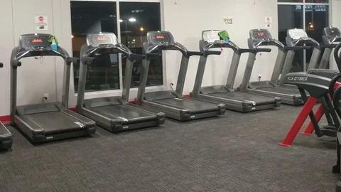 Empty Gym with Exercise Equipment and Weights Stock Footage 83402778