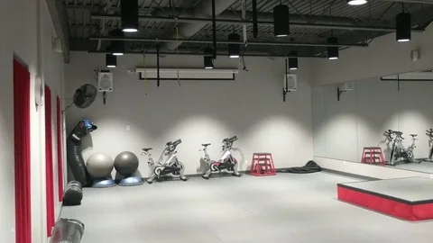 Empty Gym with Exercise Equipment and Weights Stock Footage 83402816