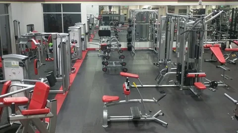 Empty Gym with Exercise Equipment and Weights Stock Footage 83403616