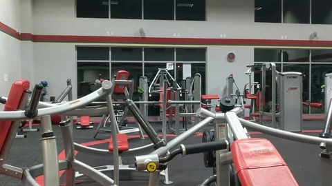 Empty Gym with Exercise Equipment and Weights Stock Footage 83403708