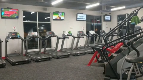 Empty Gym with Exercise Equipment and Weights Stock Footage 83403791