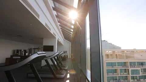Empty gym with panoramic Windows and city view Stock Footage 92528626