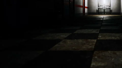 Empty hallway in a building with a checkered floor and dim lighting Stock Footage 345006286