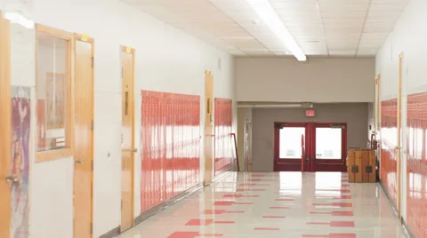 A empty hallway fills up with students when the doors open at the end of class Stock Footage 33891280