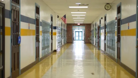 Empty hallway in high, middle, or elementary school with all the lights on. Stock Footage