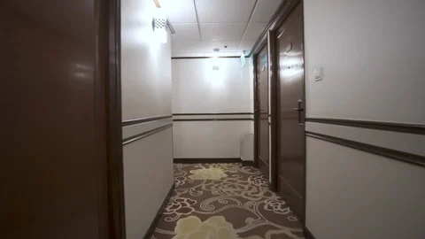 Empty Hallway in a Mysterious Old Fashioned Hotel POV Stock Footage 122802343