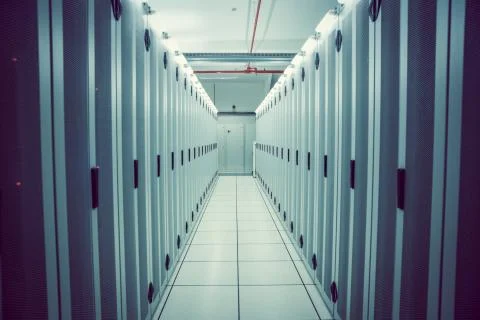 Empty hallway of server towers Stock Photos