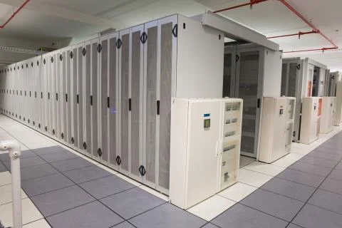 Empty hallway of server towers Stock Photos
