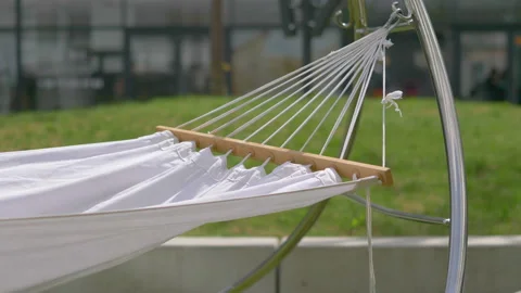 Empty hammock in the city in 4k slow motion 60fps Stock Footage 152572711