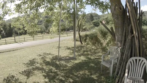Empty hand-made swing in Tuscany (Italy) Video stock 156591708