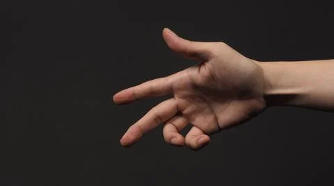 Empty Hand show five fingers with black shadow isolated on black background Stock Photos