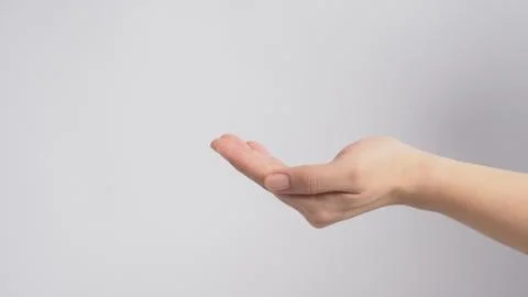 Empty hand on white background. Stock Photos