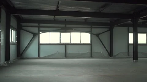 An empty hangar under construction Stock Footage 134490800