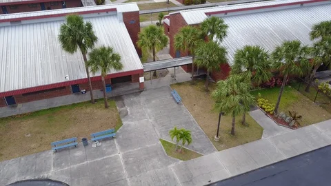 Empty High School campus Due to Coronavirus aerial Walkways Classroom Buildings Stock Footage 128673674