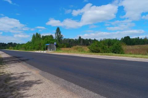 Empty highway with bus stop Stock Photos