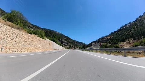 Empty highway canyon Stock Photos