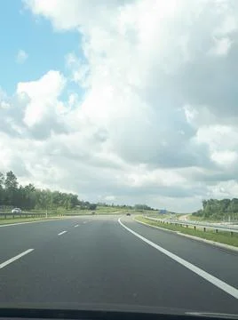 Empty highway as a concept of trips and transport. Asphalt roads in Poland. T Stock Photos
