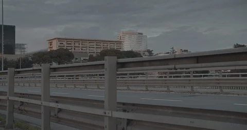 Empty highway in a deserted town, Office buildings in background, Rome Stock Footage 127801402