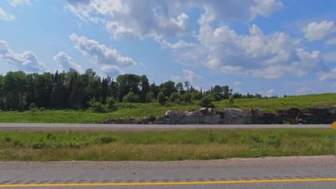Empty highway freeway side driver plate at the Pickerel Lake area, during h.. Stock Footage 314223236