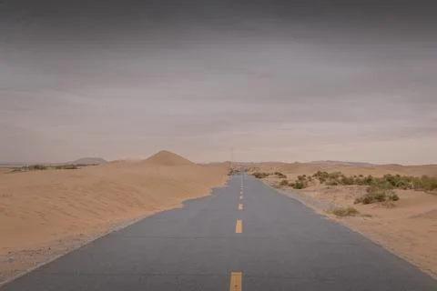 An empty highway going through the desert, Inner Mongolia, China Stock Photos