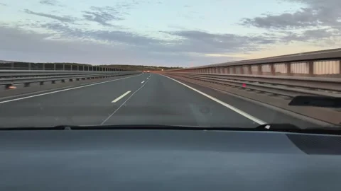 Empty Highway at Golden Hour with a Gentle Curve Stock Footage 341396204