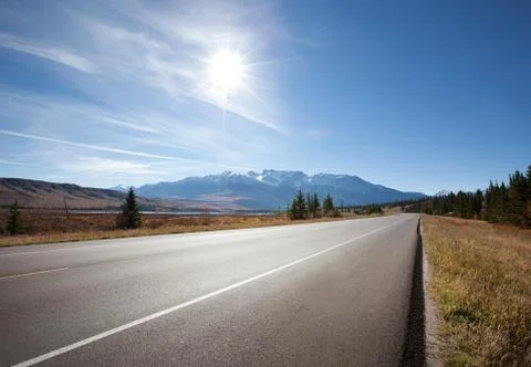 Empty highway in Jasper, Canada Stock Photos